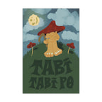 Print illustration of a Filipino mythical creature called Duwende with a mushroom hat on a grassy green hill with the text "Tabi Tabi Po" and mushrooms on each side under a cloudy night sky and a yellow glowing moon